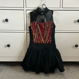 red and gold sparkly black dance costume